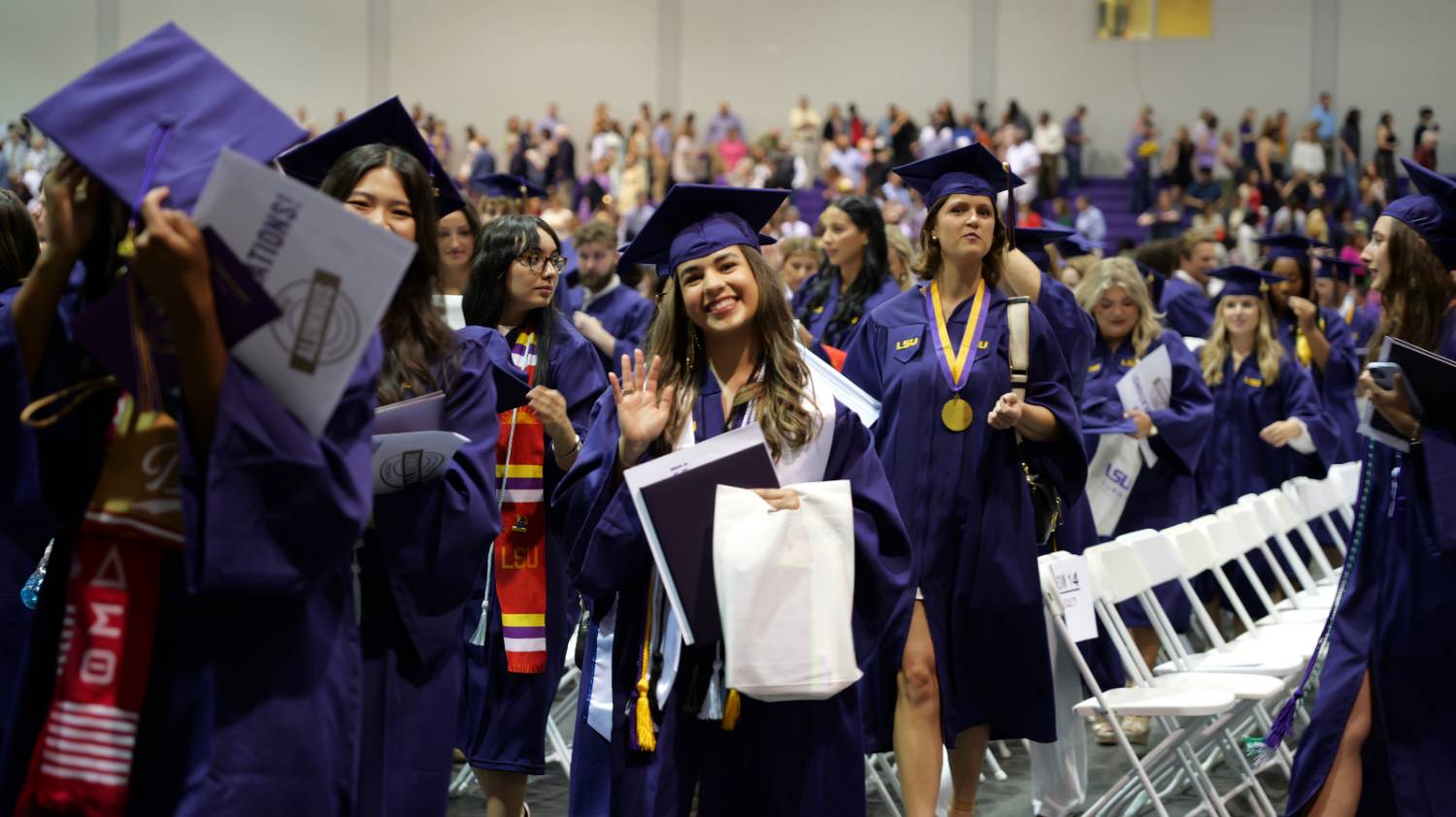 Student holding diploma