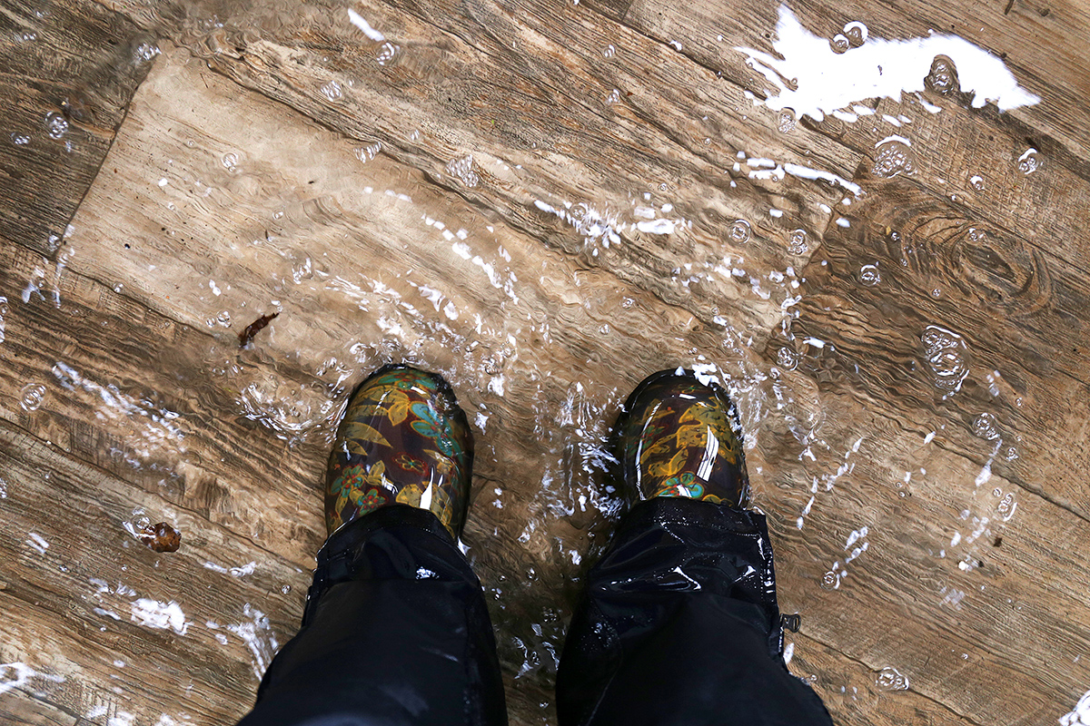 Standing in a flooded house