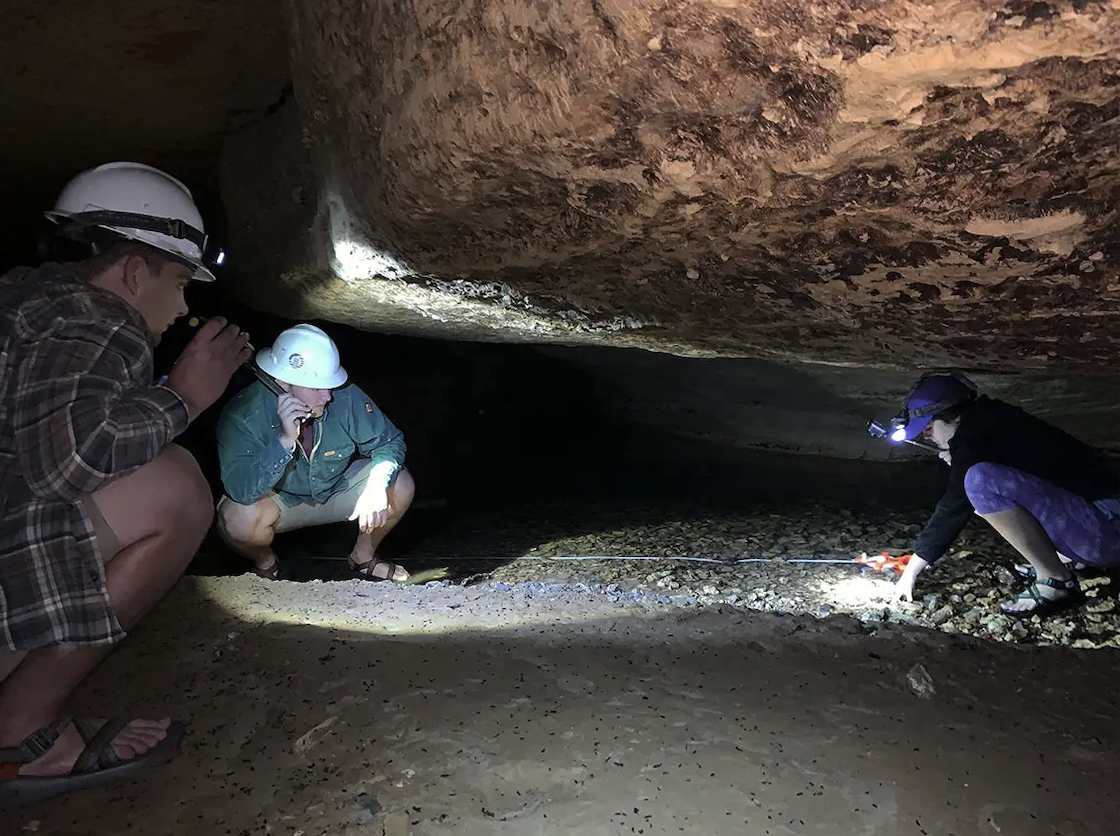 students in a cave
