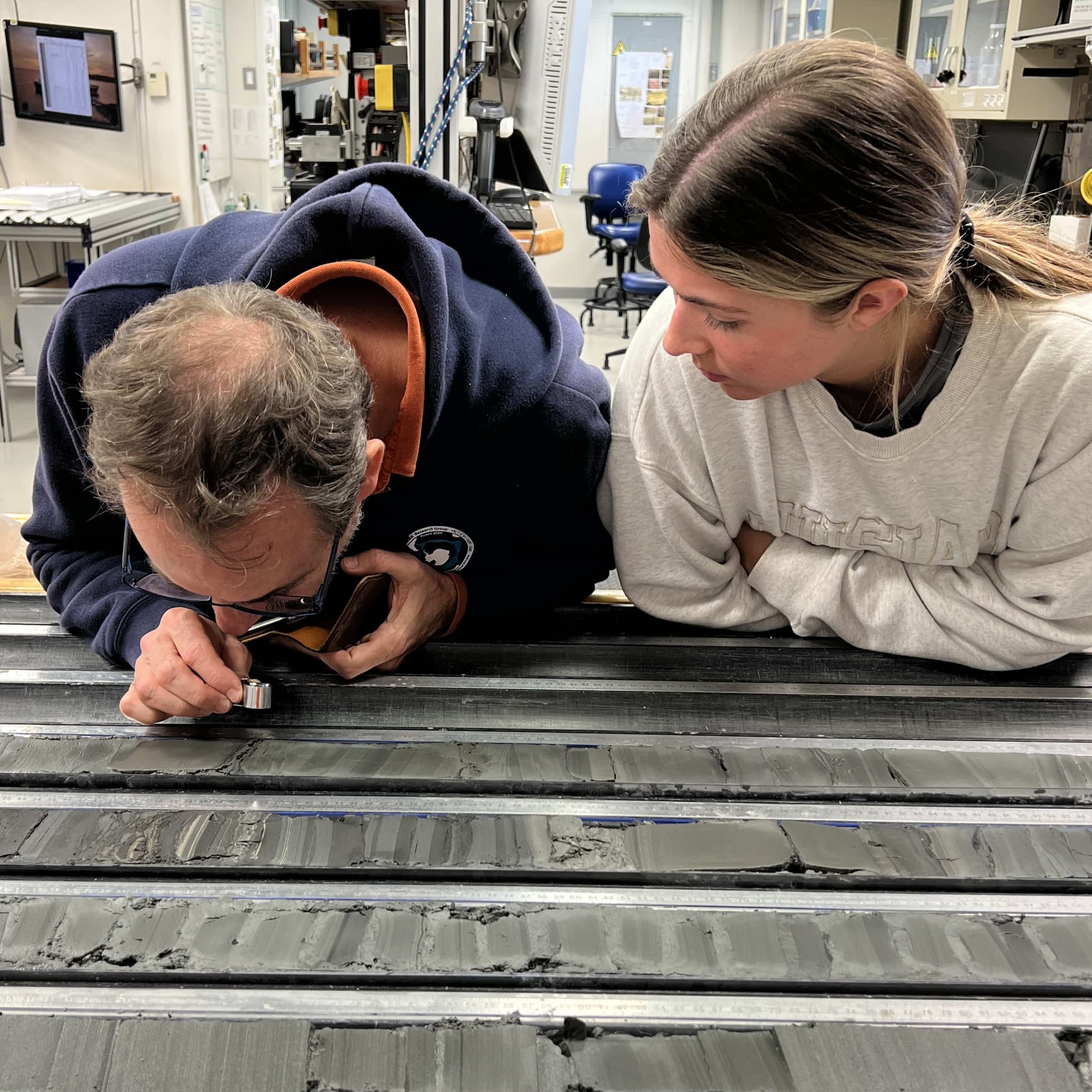 student and professor in a lab