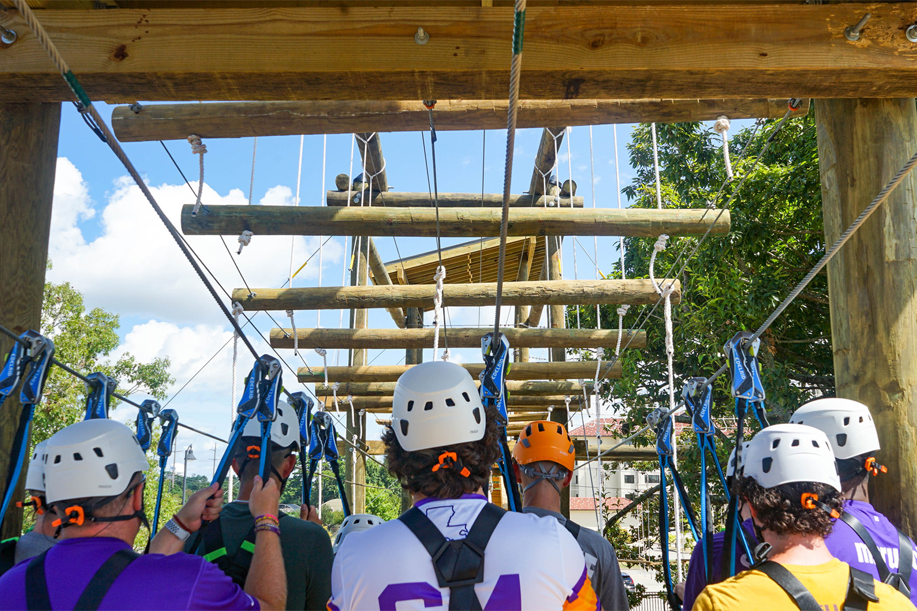 Patrons preparing to complete challenge course